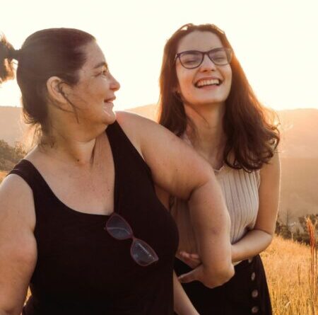 mom and daughter smiling after family counseling