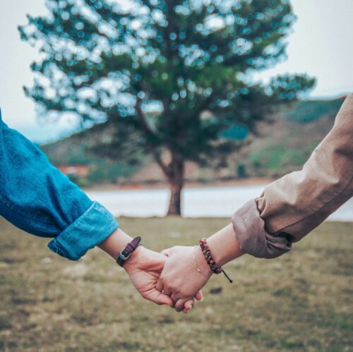 a couple holding hands