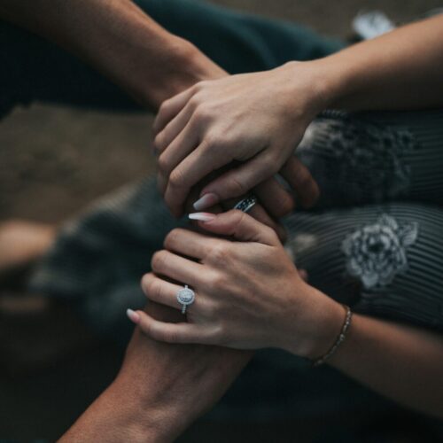 a philadelphia couple holding hands after marriage counseling