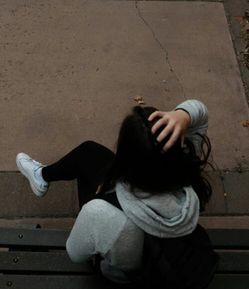 Woman showing emotional distress, illustrating the need for religious trauma therapy in Philadelphia