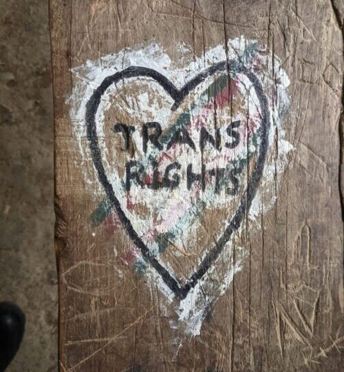 Faded graffiti heart with 'trans rights' text, symbolizing the need for gender affirming therapy in Philadelphia