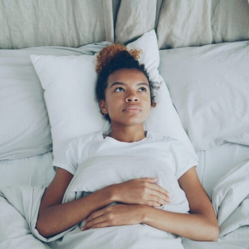 a woman who can't sleep representing Generalized Anxiety Disorder