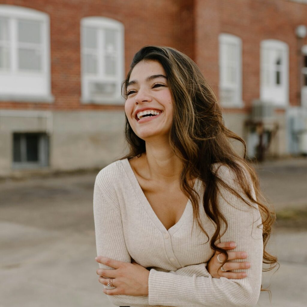 a happy woman after therapy for depression